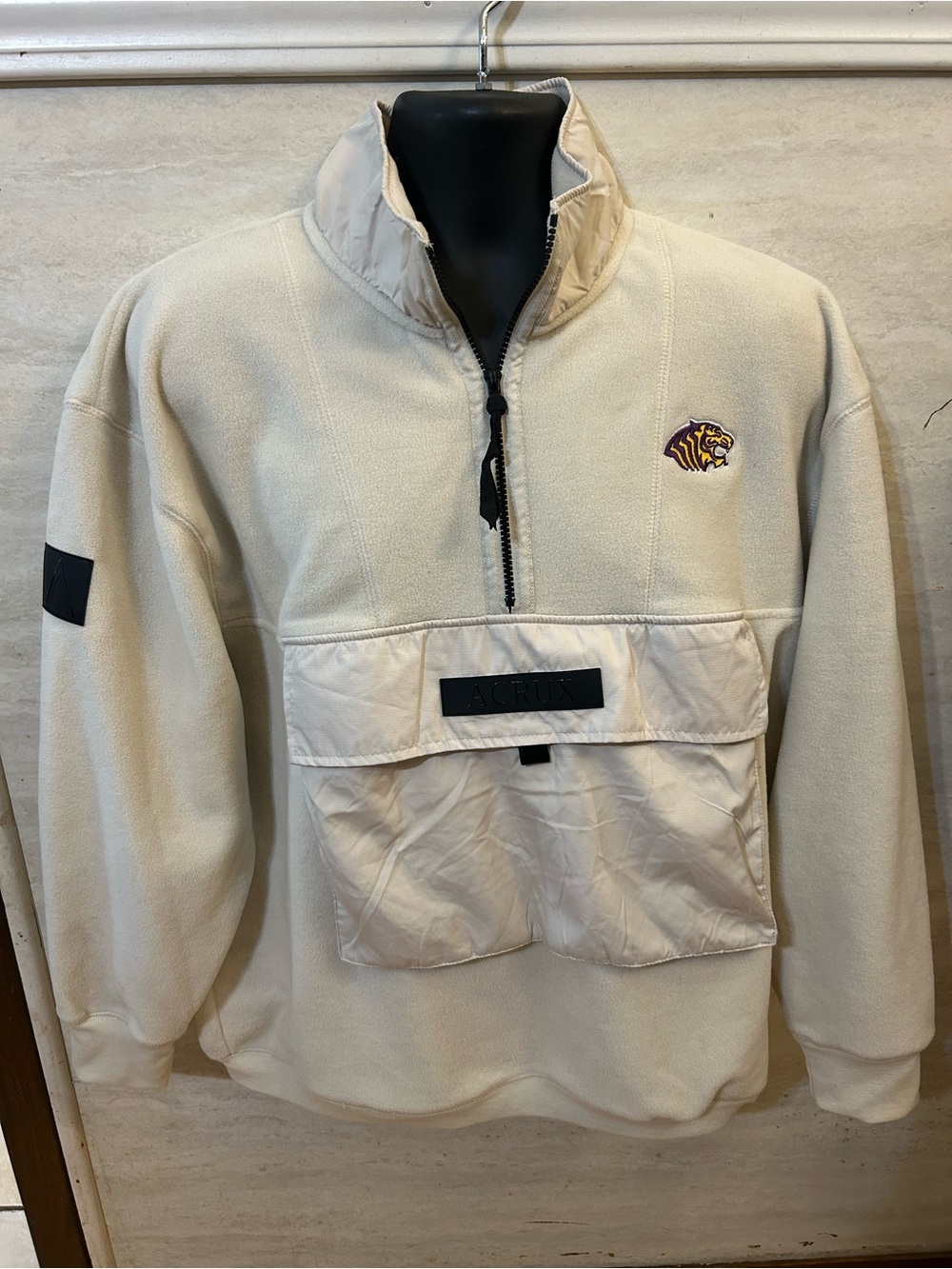 Acrux brand quarter-zip fleece pullover jacket 
Official Ouachita Baptist Tigers